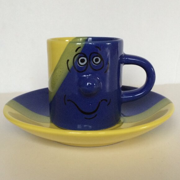 Funny Face 3D Protruding Nose Espresso Cup Saucer Set Blue Yellow Ceramic 2 oz - Picture 1 of 8